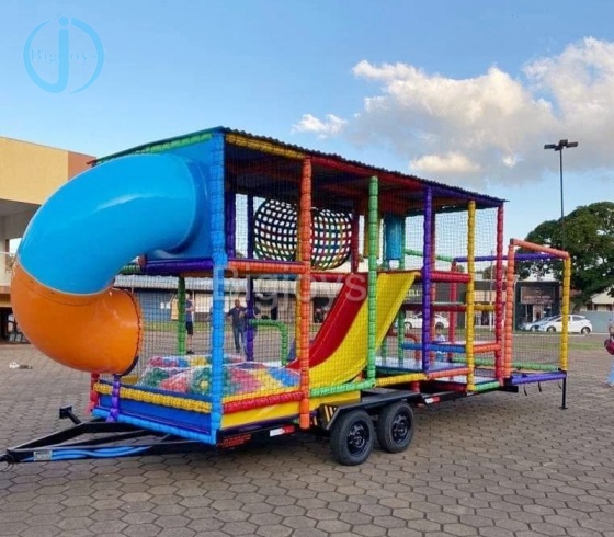 Movable playground with trailer